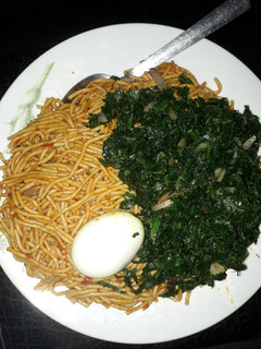 A picture of Spaghetti with egg and vegetable(ugu).