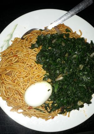 A picture of Spaghetti with egg and vegetable(ugu).