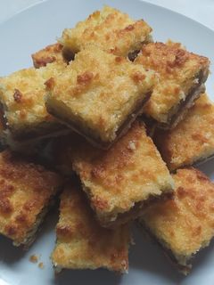 Una foto de Tarta o Cuadrados de Coco y Dulce de Leche Materos