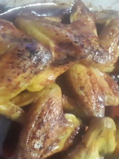 Una foto de Alitas de pollo con soja y miel