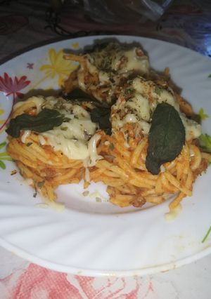 Une photo de Speghitti avec sauce bolognaise