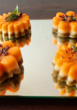 A picture of Tricolor cup cake dhokla.