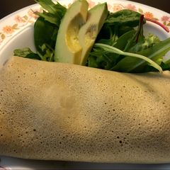 A picture of Mouth watering breakfast wrap.