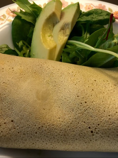 A picture of Mouth watering breakfast wrap.