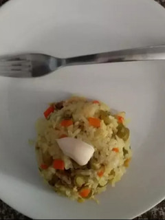 Una foto de Arroz con pollo y cúrcuma