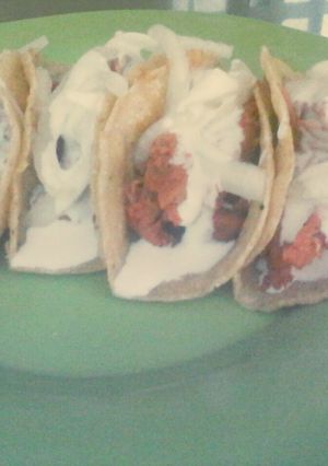 Una foto de Taquitos de cochinita pibil