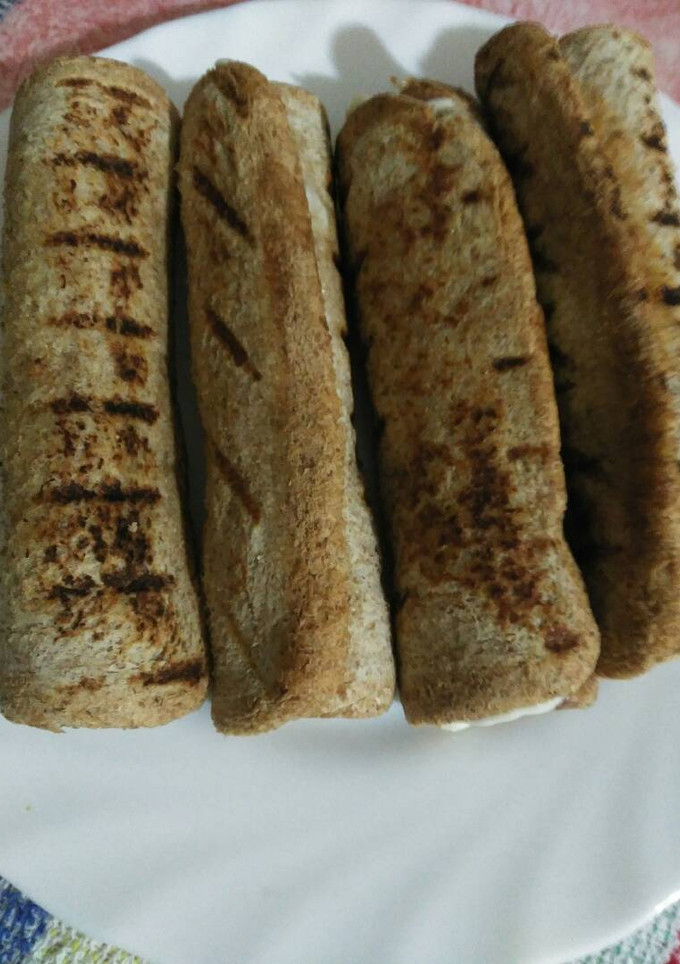 Una foto de Rollitos de salchicha y pan de molde