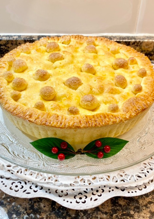 Una foto de Pastel rústico relleno de crema pastelera y manzana