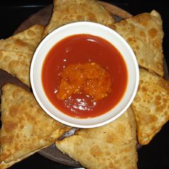 A picture of Paneer cheesy parcel.