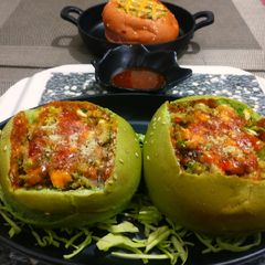 A picture of Pav filled with bhaji(pav,bhaji baked).