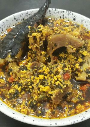 A picture of Egusi with bitterleaf soup.