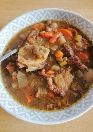 A picture of Beef and vegetable soup.