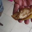 Chile güero asado relleno de plátano, canela y tequila
