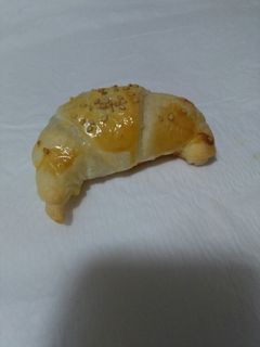 Una foto de Cruasanes mini de salchichas y queso