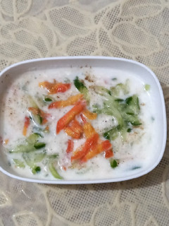 A picture of Carrot and cucumber raita🥕🥒🥕.