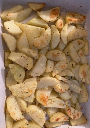 Una foto de Papas al horno estilo rústico