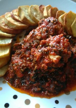 A picture of Grilled Fish in Garlic and Veggie Stew Paired with sweetPotatoes.