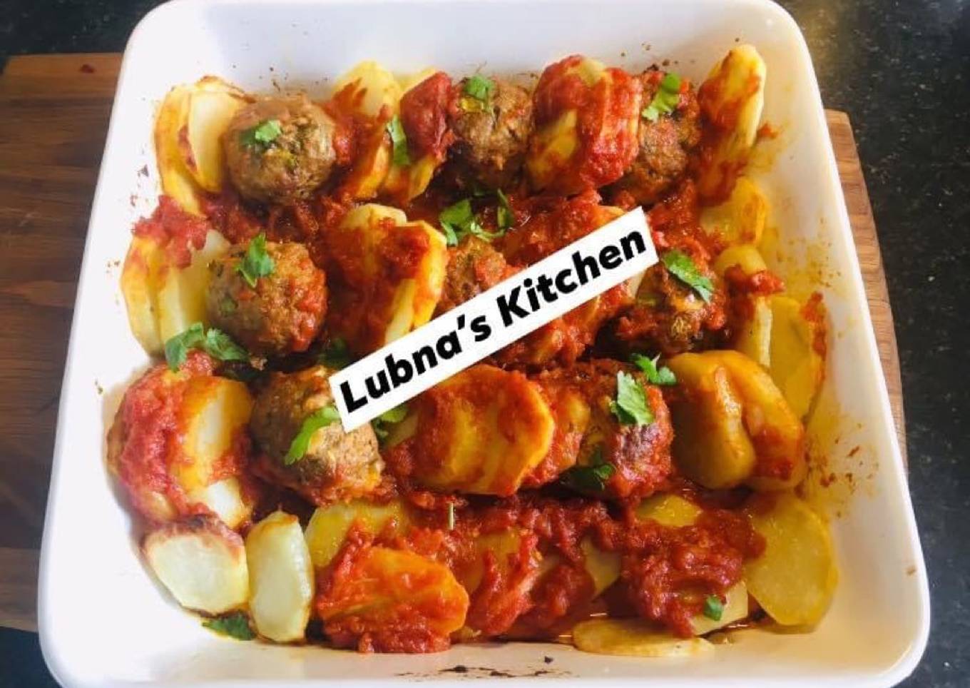 Baked Meatballs and Potatoes In Tomato Sauce: