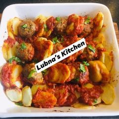 A picture of Baked Meatballs and Potatoes In Tomato Sauce:.