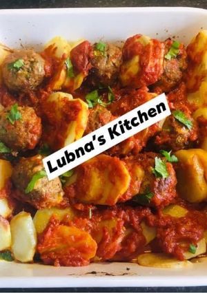 A picture of Baked Meatballs and Potatoes In Tomato Sauce:.
