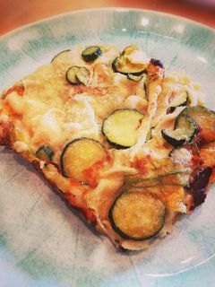 Foto di Lasagnetta di pane carasau con fiori di zucca, zucchine e mozzarella
