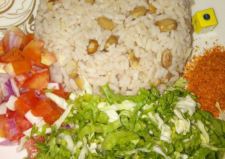 Rice and beans with salad