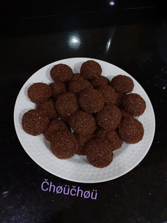 صورة لوصفة حلوة بالفلان و جوز الهند 💜