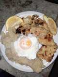 Merluza grille con puré y huevo poché