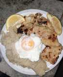 Merluza grille con puré y huevo poché