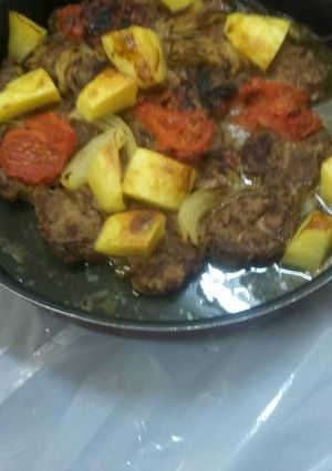 A picture of Kofta Baked in a Tray (Lahmeh bil Saniyeh).