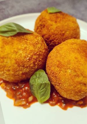 Une photo de Arancini