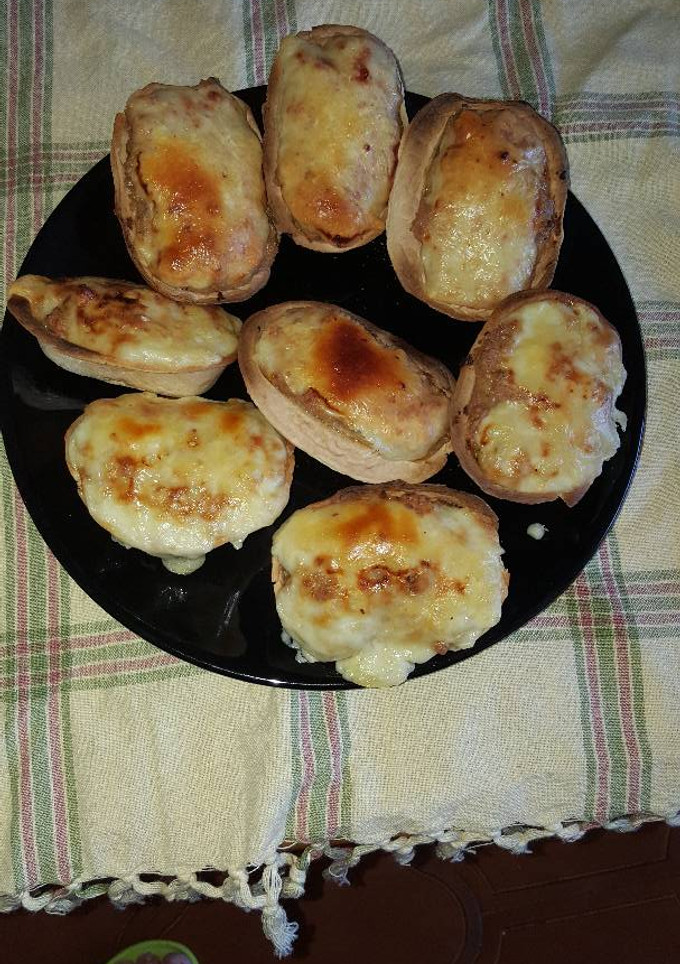 Una foto de Barquitos de pollo y queso