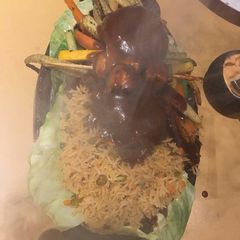 A picture of Paneer tikka sizzling briyani.