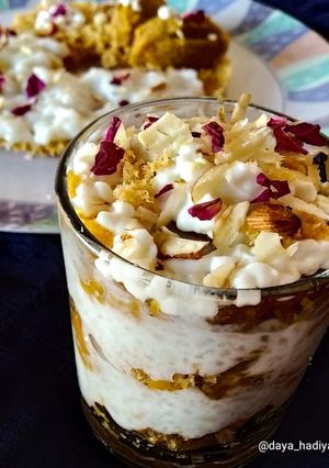 A picture of Layered ghevar dessert glass.