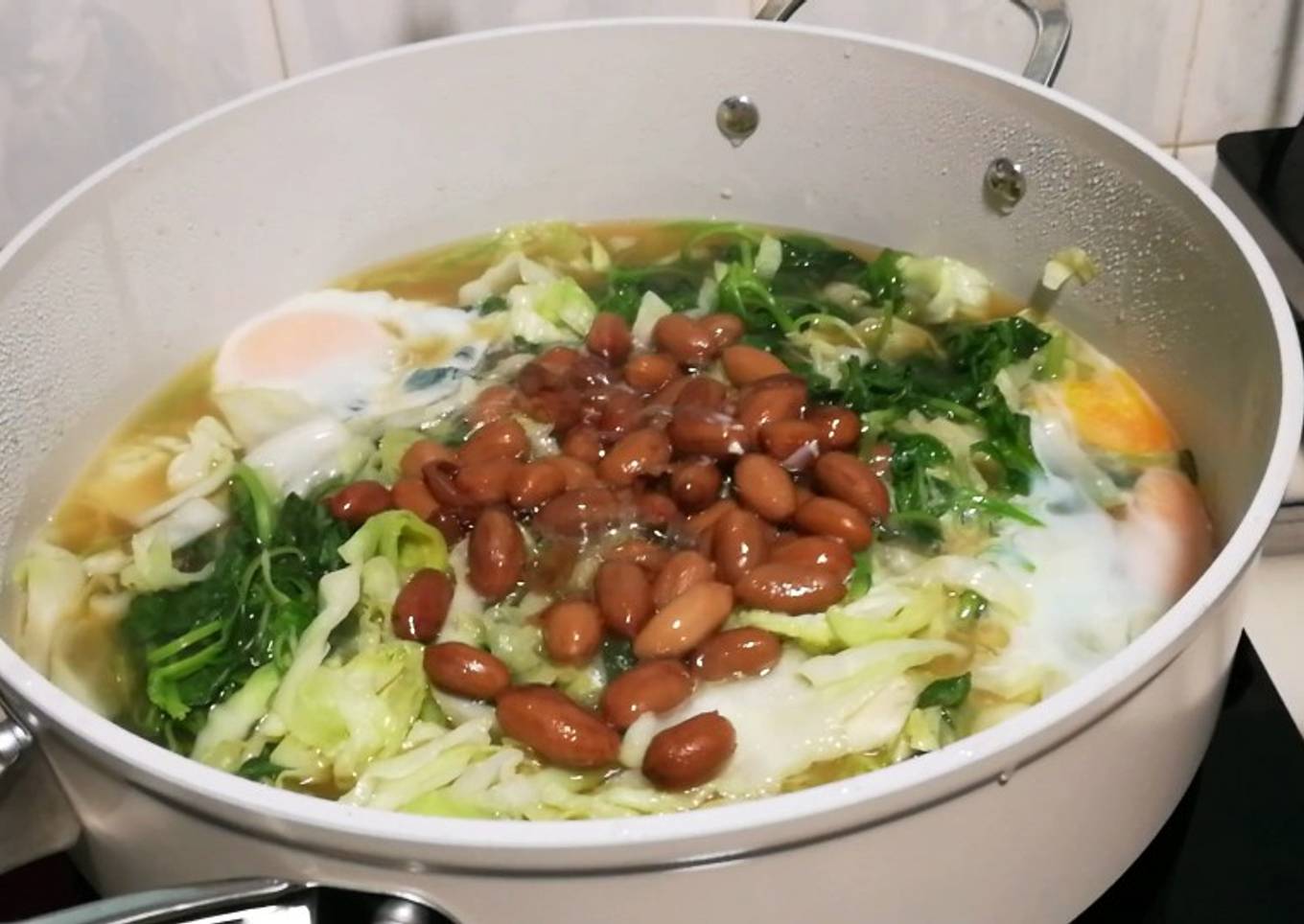 Cabbage And Chinese Spinach With Eggs In Kelp Stock