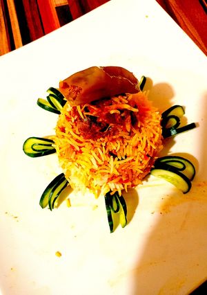 A picture of Chicken salan biryani.