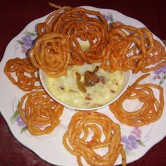 Indian desserts paneer kheer with jelebi A picture of Indian desserts paneer kheer with jelebi.