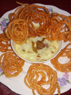 A picture of Indian desserts paneer kheer with jelebi.
