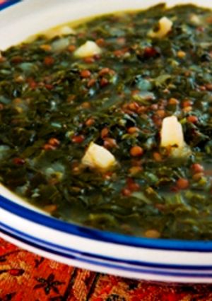 A picture of Brown lentil and spinach soup - adas bi hamod.