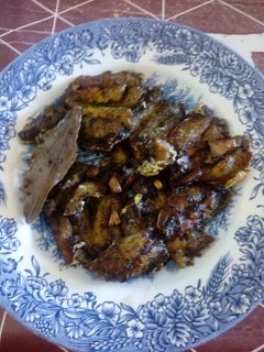 Una foto de Sardinas y berenjenas rebozadas