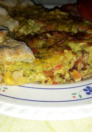 Una foto de Tarta de zapallitos y panceta