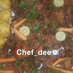 A picture of Pepper chicken garnished with fried whole irish.