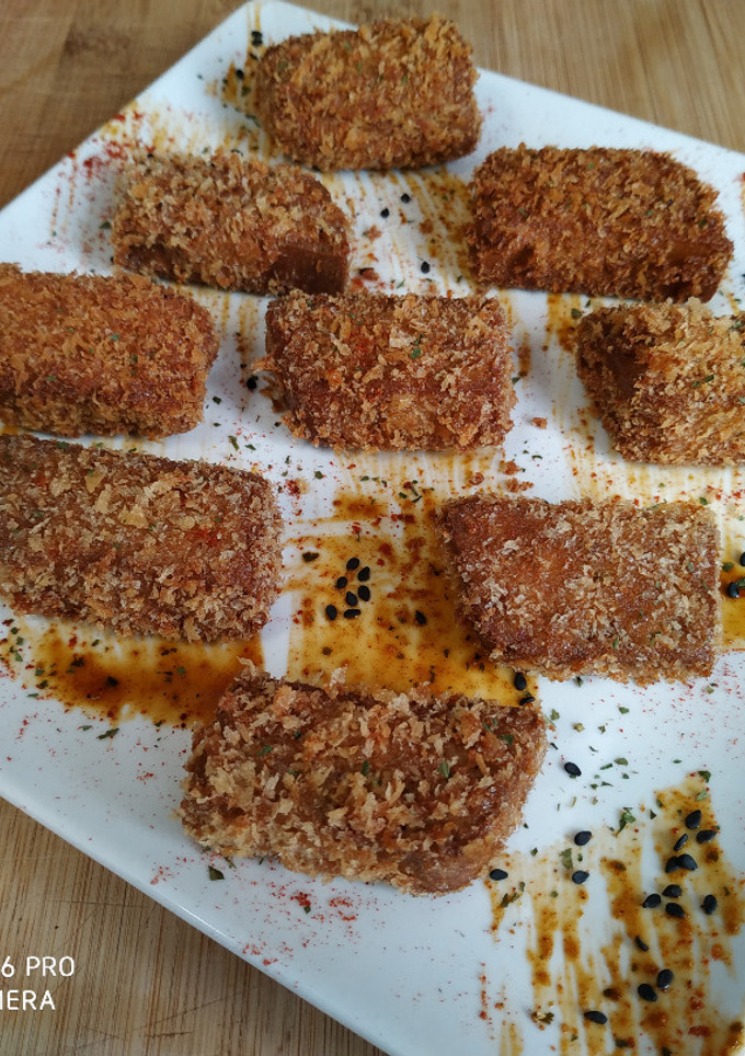 Una foto de Tofu marinado frito