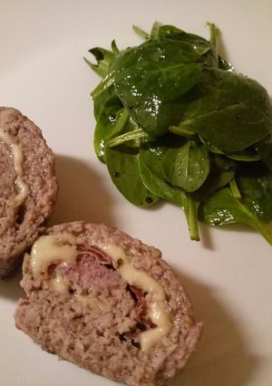 A picture of Polpettone - Italian meatloaf with parma ham and cheese.