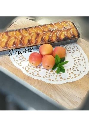 A picture of 🍑🍰Apricot Frangipane Tart🍰🍑.
