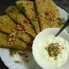 A picture of Stuffed Coconut Paratha.