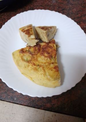 Foto principal de Tortilla de papas chips con cebolla y perejil