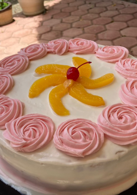 Una foto de Pastel tres leches de durazno