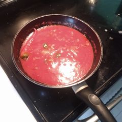 A picture of My Dad's spaghetti sauce.