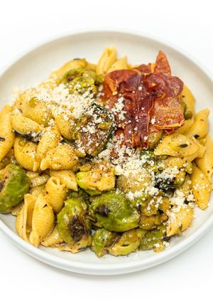 A picture of Brussels Sprouts Carbonara with Browned Butter, Miso, and Crispy Prosciutto.
